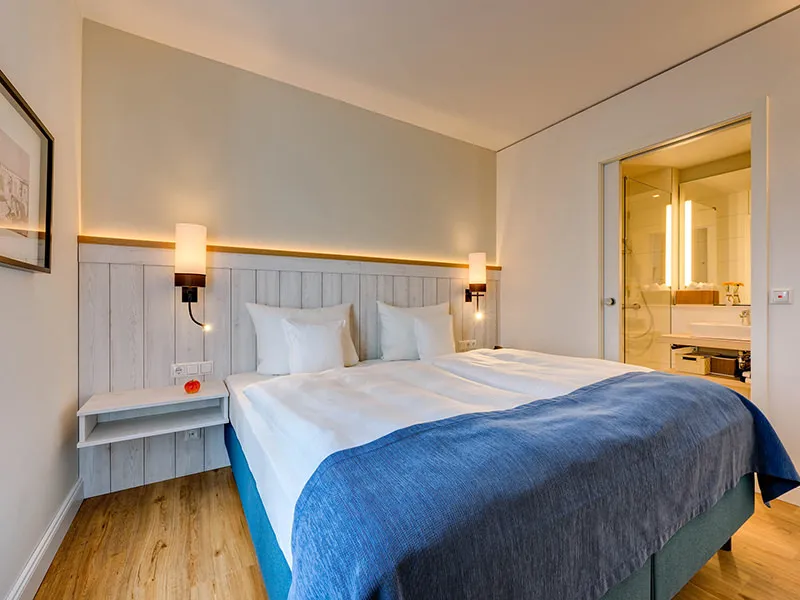 Schlafzimmer in der Suite Strandhaus Hotel Erholung