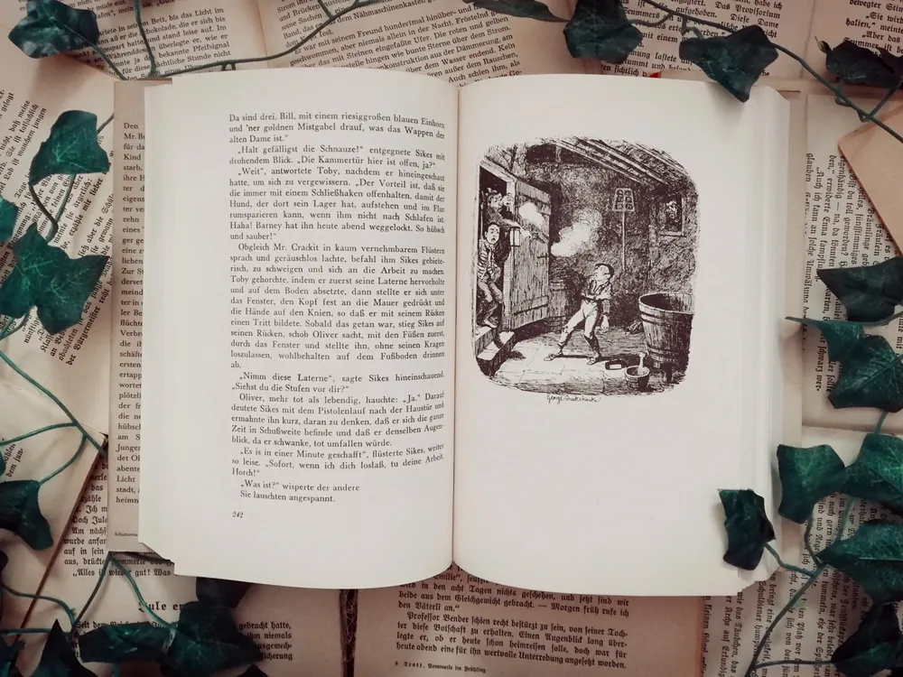 Eine alte Buchillustration, die eine düstere Szene aus &quot;Oliver Twist&quot; mit Fagin und seiner Bande zeigt.