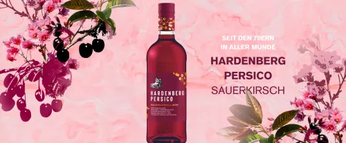 Erfrischender Persico Longdrink oder Cocktail mit Kirschen und Minze