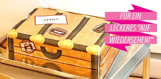 Farbenfrohe Torte in Kofferform für Abschied und gute Reise online bestellen