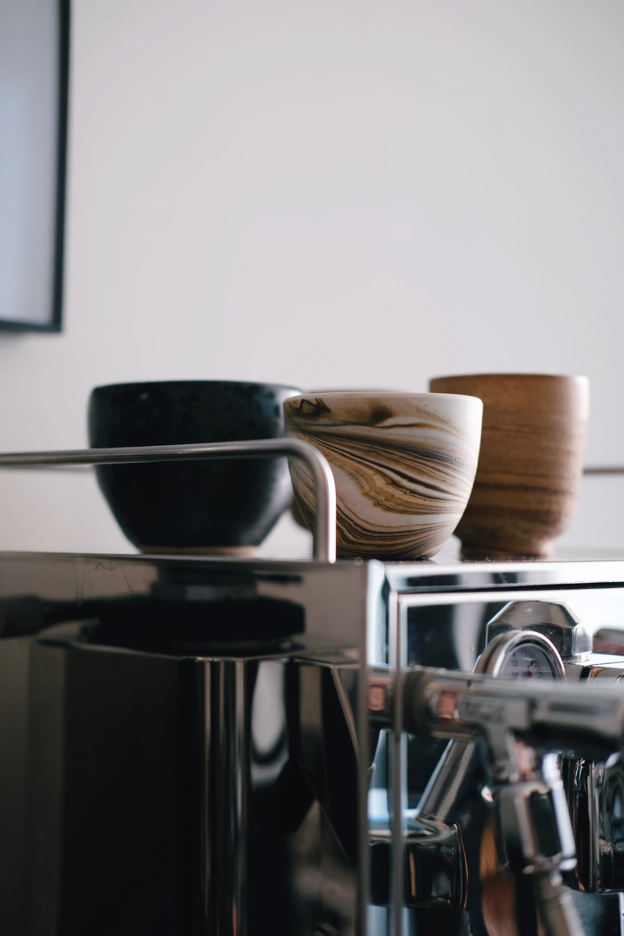 Frontansicht der ECM Mechanika Max mit E61 Brühgruppe und Hebeln