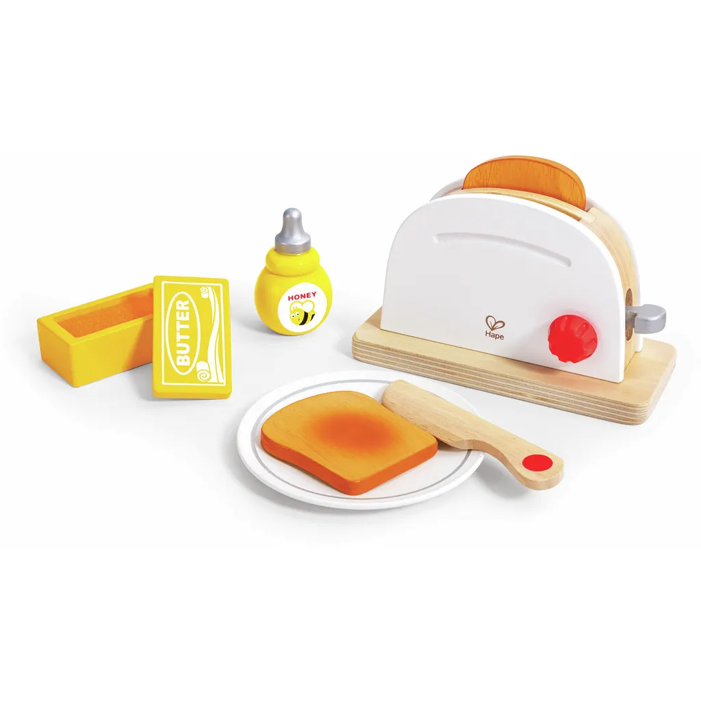 Nahaufnahme eines Spielzeug Toasters mit Toastscheiben