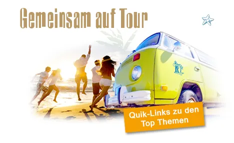 Reisende vor einem Bus