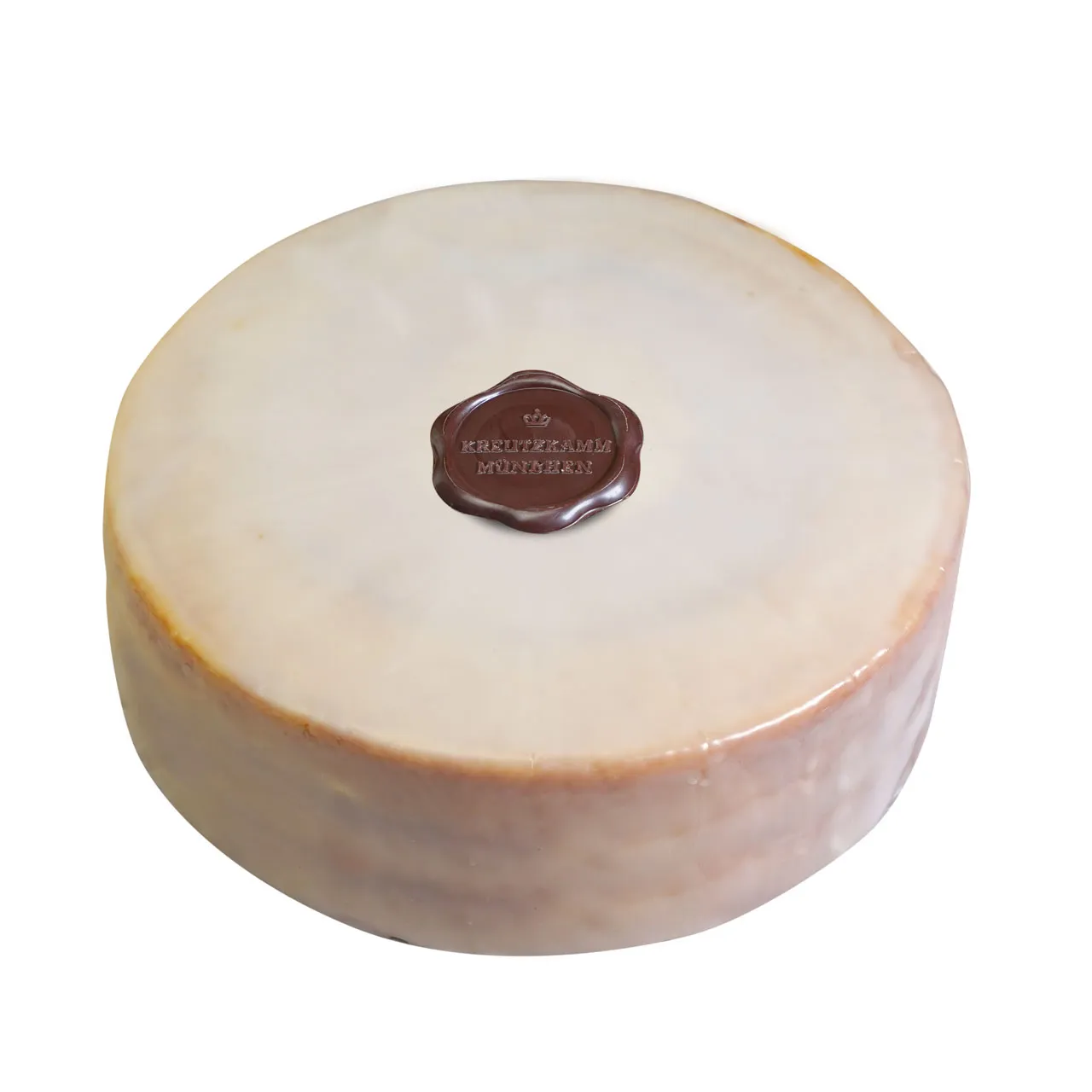 Runder Baumkuchen mit eleganter weißer Fondantglasur, perfekt als Geburtstagskuchen.