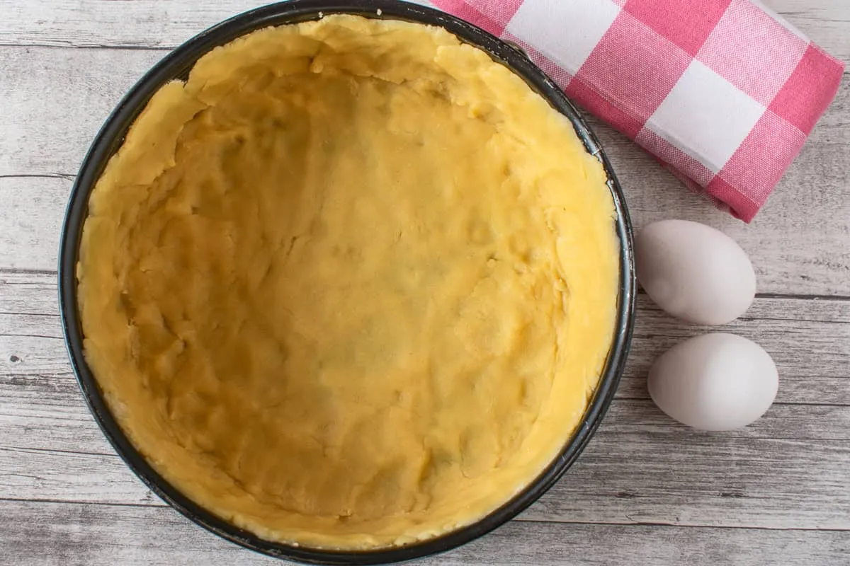 unbaked pastry crust in springform