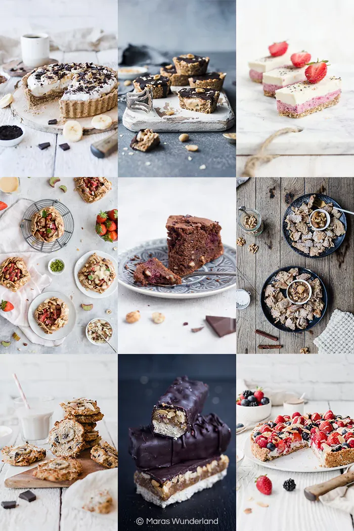 Verschiedene gesunde Backwaren auf einem Holztisch, darunter Brot, Kuchen und Kekse