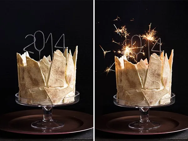 Die elegante weiße Silvester-Torte mit funkelnder Schokoladendeko