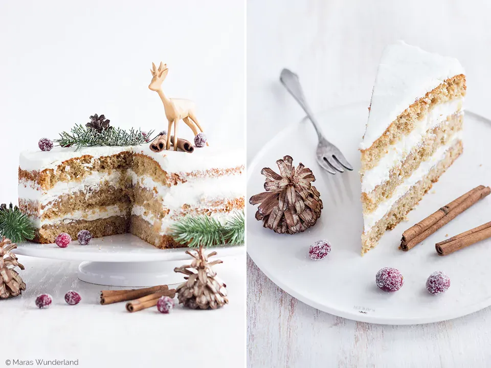 Ein Querschnitt der Apfel-Weihnachtstorte, der die drei Biskuitböden und die Schichten von Apfelkompott und Quarkcreme zeigt