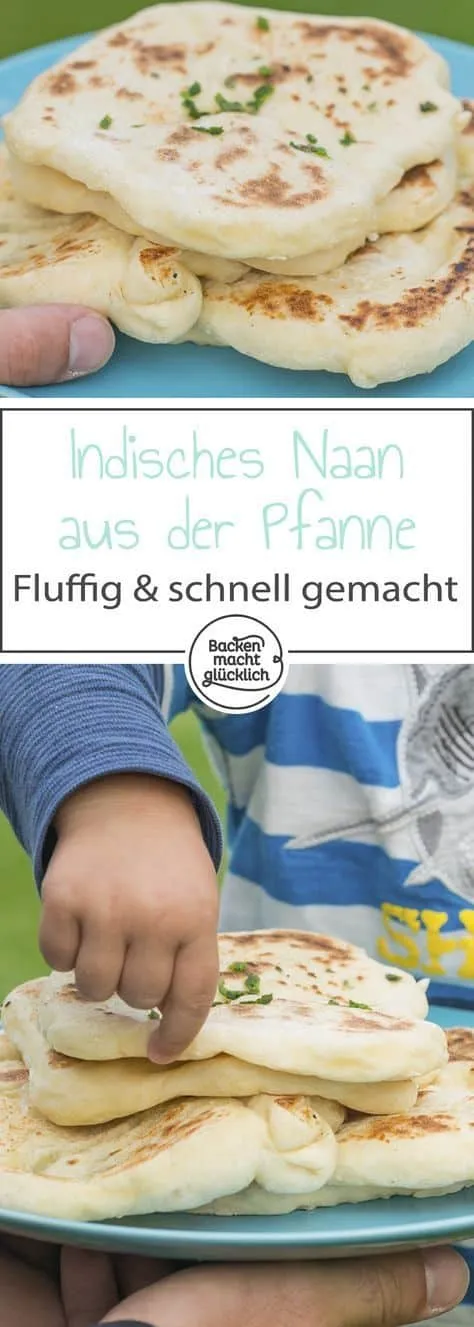 Großes, appetitliches Naan-Brot auf einem Holzbrett, mit frischen Kräutern