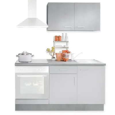 Kompakte Miniküche mit grundlegenden Elektrogeräten für kleine Wohnungen