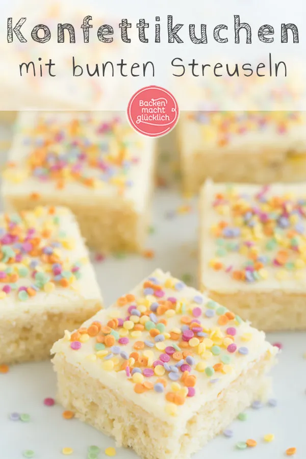 Nahaufnahme eines köstlichen Konfetti-Kuchens, mit vielen bunten Zuckerstreuseln im Teig und auf dem Frosting