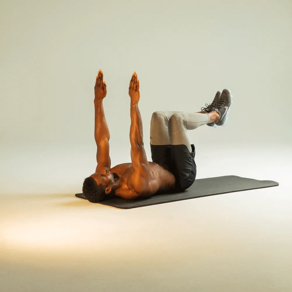 Person führt Dead Bug Übung auf dem Boden aus