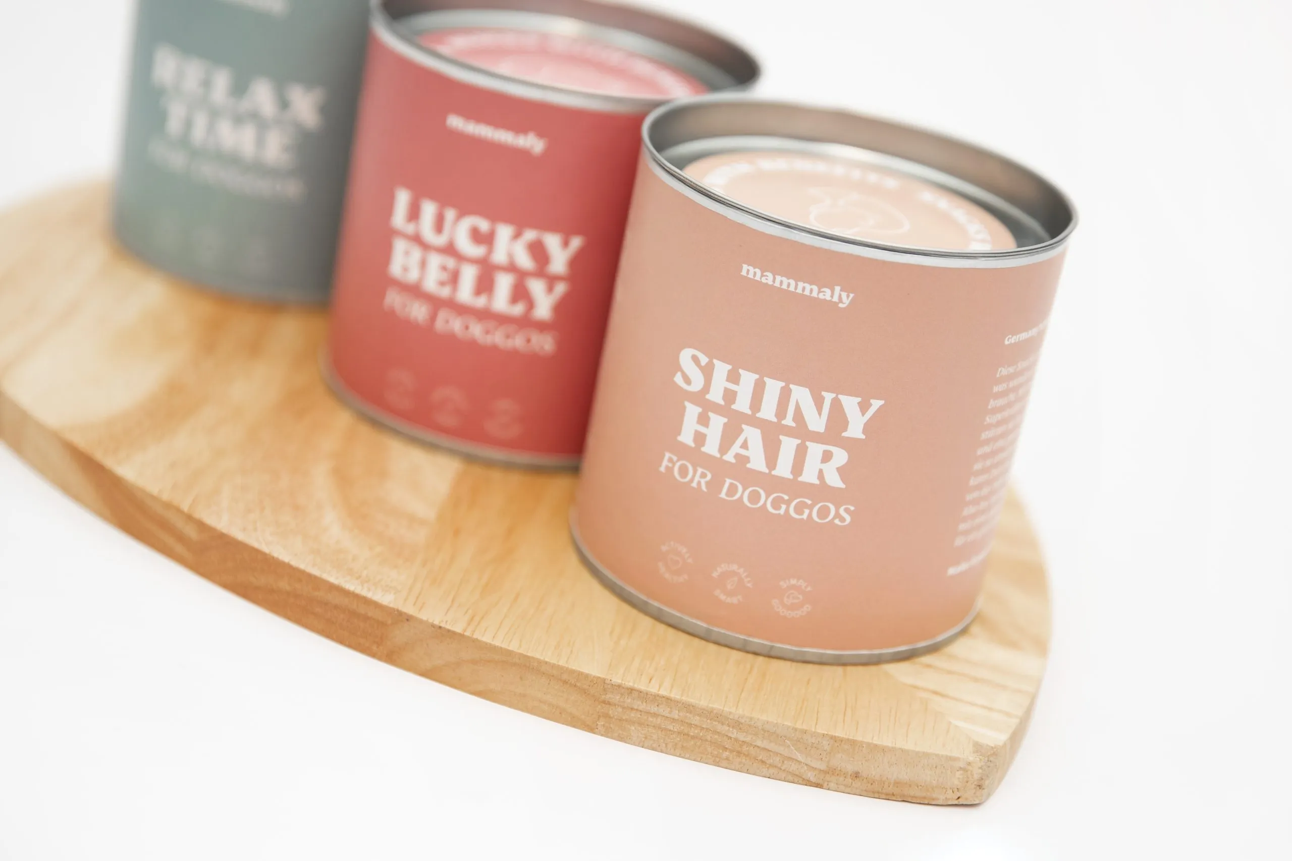 Verpackung der Mammaly Hundesnacks mit verschiedenen Geschmacksrichtungen.