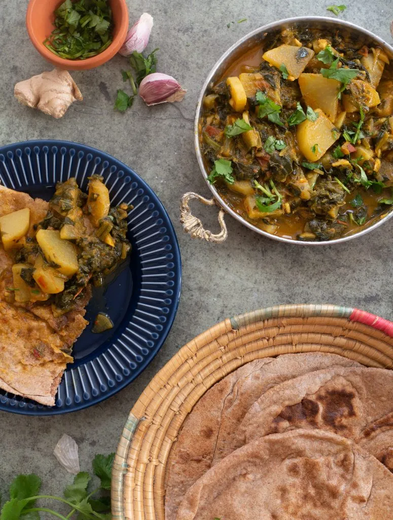 Zubereitungsschritt: Rettich und Spinat im Curry