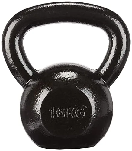 Frau mit Kettlebells trainierend