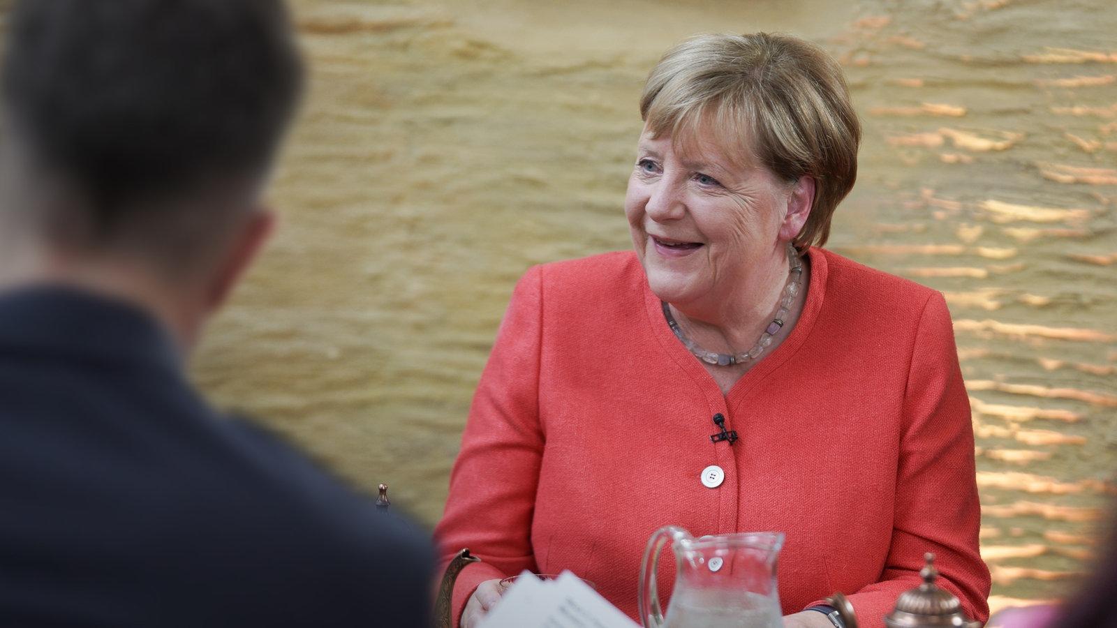 Angela Merkel trifft Flüchtlinge in Deutschland