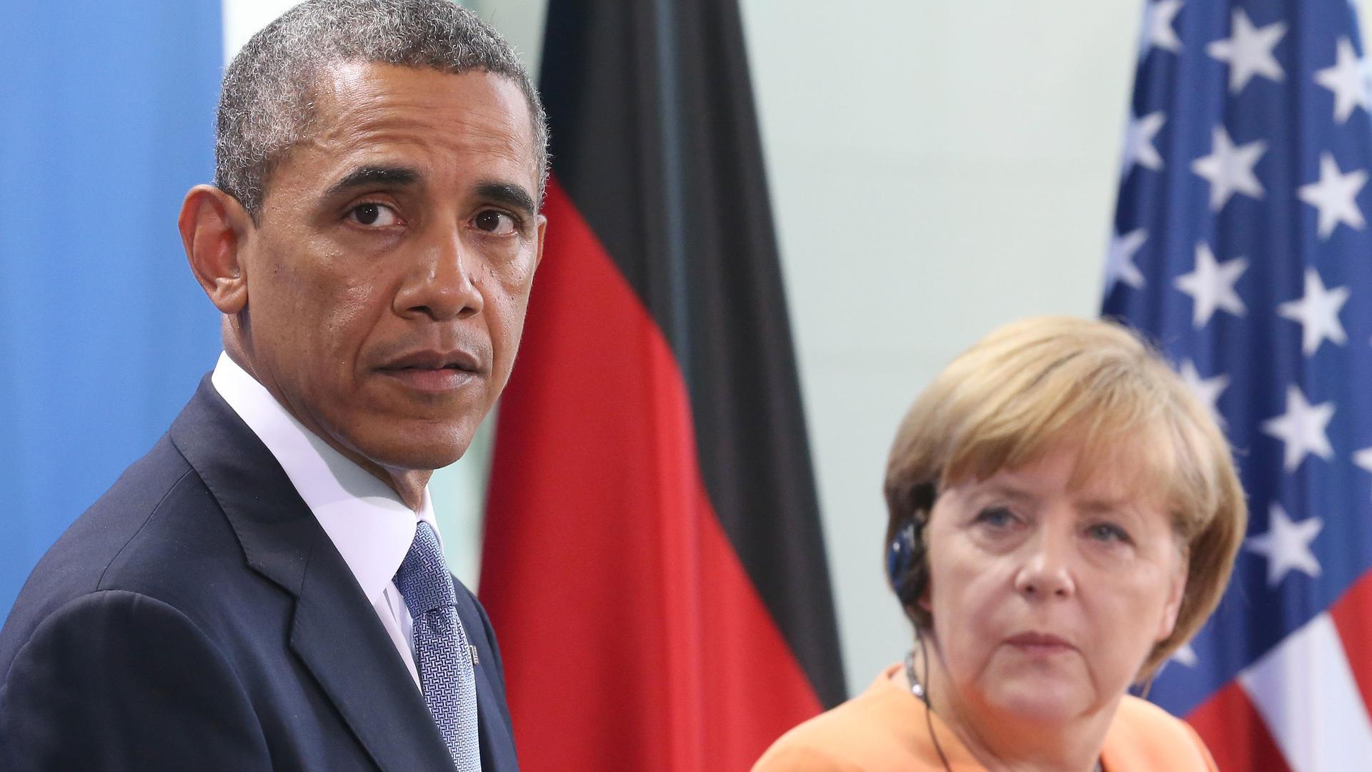 Angela Merkel und Barack Obama mit ernsten Mienen nach dem Abhörskandal.