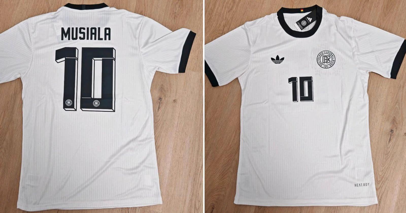 Toni Kroos im DFB-Trikot, wie er 2014 den Weltmeistertitel feiert, ein Symbol für seine Präsenz als nationalspieler toni kroos.