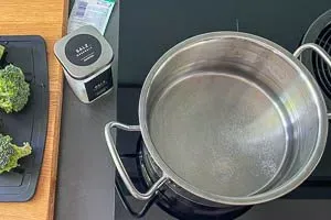 Wasser in einem Kochtopf zum kochen bringen