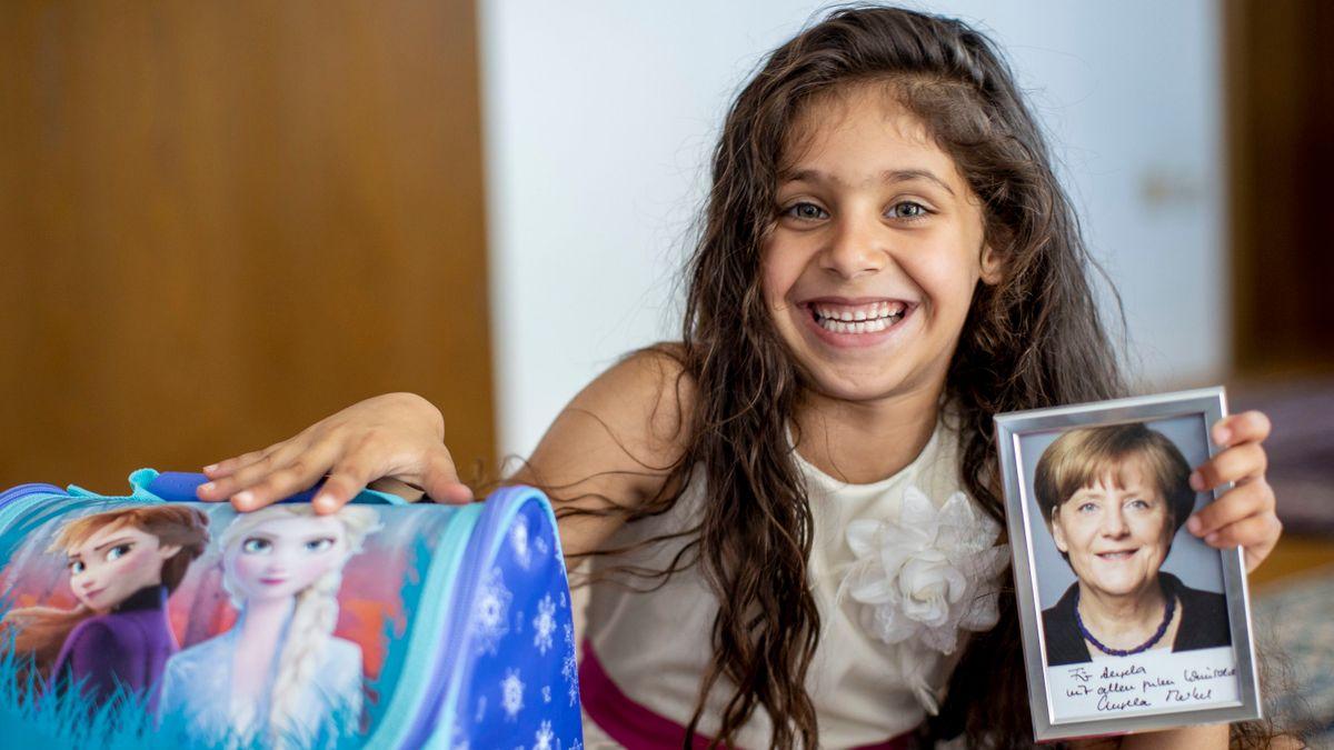 Angela Merkel Autogramm Briefkopf mit Unterschrift und Widmung