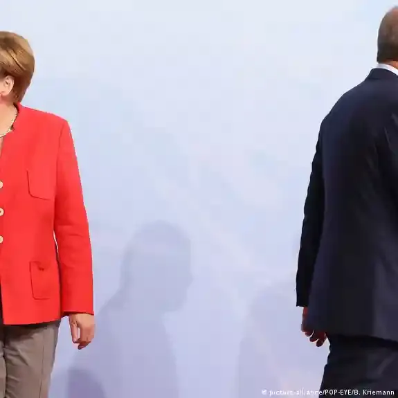 Angela Merkel und Recep Tayyip Erdoğan bei einem Treffen in Ankara, symbolisch für die komplexen Verhandlungen zwischen Deutschland und der Türkei